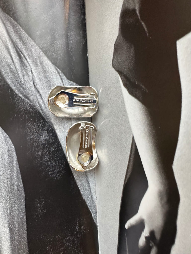 Clips in white metal from the Fashion House Christian Dior